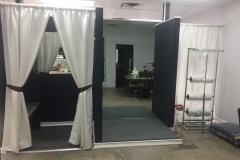 Alterations changing room at Tailor Fit Cleaners.